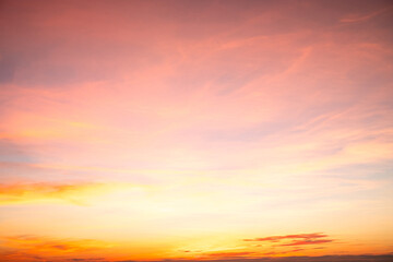 Fototapeta premium Beautiful , luxury soft gradient orange gold clouds and sunlight on the blue sky perfect for the background, take in everning,Twilight, Large size, high definition landscape photo