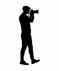 silhouette of a person with a camera