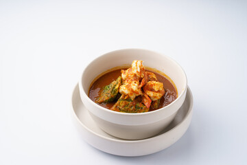 Delicious Shrimp Curry in Bowl on White Background