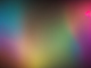 Fototapeta premium Blurred rainbow colors on a black background.