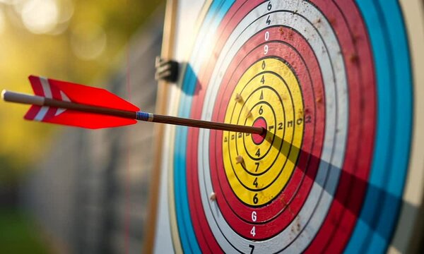 An arrow flying towards the bullseye of a colorful target, symbolizing precision and focus. Generated with AI