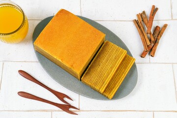 Delicious and delicate Indonesian Lapis Legit, a rich and buttery layered cake made with eggs,...