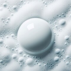 A large, white soap bubble among the foam.