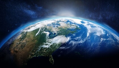 Fototapeta premium 宙空間から見下ろす美しい地球。青と白のマーブル模様が広がり、青い海や白い雲、緑の大陸が太陽の光を受けて広がっている。その背景には無限の宇宙と星々が広がる、地球の豊かさと儚さが見えてく.j