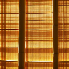 Sunlight filtering through woven bamboo shades