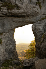 window in the cave at sunrise in the basque country