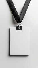 Blank white badge with black lanyard on a white background.