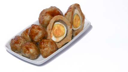 Pentol is a typical Indonesian spicy snack made from beef and tapioca flour.