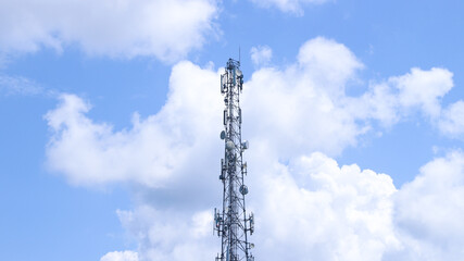 Telecommunication (5G 4G) tower mast on sky background. Cellular telephone network or Digital wireless connection system. Receiving station Antenna.