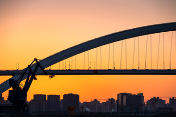 Fototapeta premium Urban arch bridge at dusk, Lupu Bridge scenery in Shanghai, China