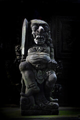 Ancient sculptures in the city of Ubud on the island of Bali, Indonesia.