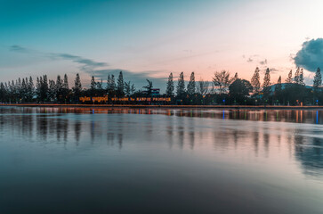 Fototapeta premium The riverside of the Praek Tuek Chhu River in Kampot in Cambodia at sunset