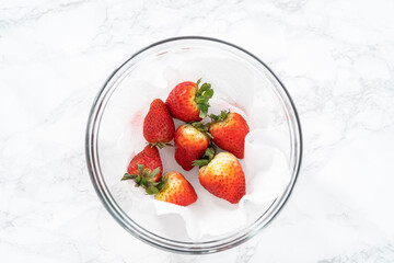 Washed and Dried Strawberries Neatly Stored in a Glass Bowl