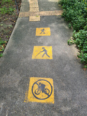 No bike and walkway signs were painted on the road