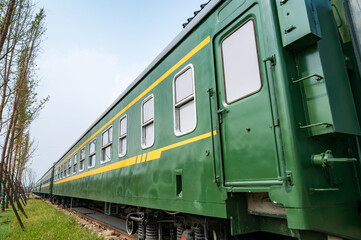 Obraz premium Old green passenger train in China