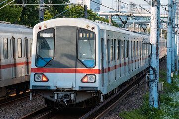 A subway train running on ground tracks in Shanghai, China.