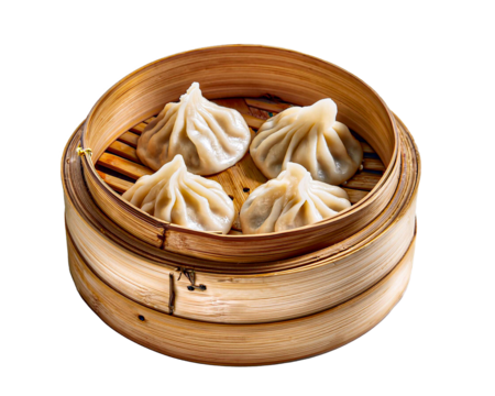 soup dumplings in bamboo steamer isolated