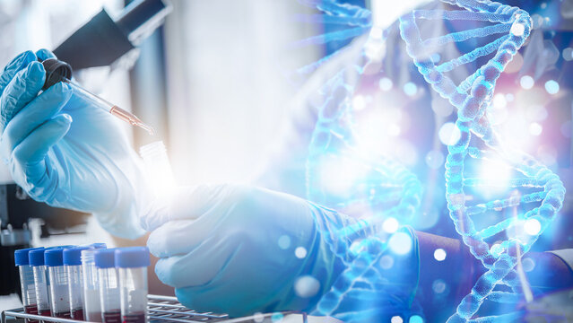 lab technician assistant analyzing a blood sample in test tube to research DNA at laboratory with microscope. Medical, pharmaceutical and scientific research and development concept.	