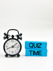 the words Its Quiz Time on wooden block. the concept of answering quizzes or quiz games