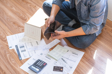 Stressed, Problem people asian woman hand holding and open an empty wallet not have money, credit card, not to payment bill, loan or expense in pay. Bankruptcy, bankrupt and debt financial concept.