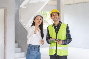 Builder team, foreman asian young engineer, architect man, woman working, discussing construction...