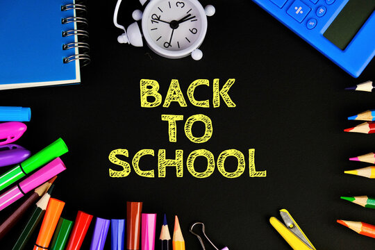 text BACK TO SCHOOL with black board and school tools and stationeries for back to school conceptional. 