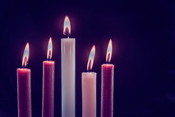 5 advent candles, pink, purple and white colors, isolated, 5 five candles burning