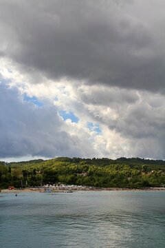 big white clouds over the sea, seashore, coast near Paliouri, Greece, water, beach