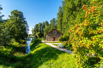 Building for flax storage in the Mikhailovskoye museum-estate in the Pushkin Mountains, Pskov region, Russia