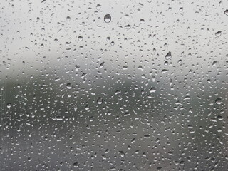 Water Droplets on Glass During a Downpour