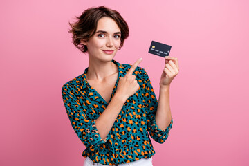 Portrait of cheerful adorable woman wear print blouse indicating at card recommend best credit plan...