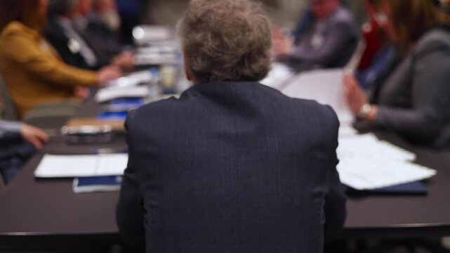 Board of directors in meeting room, Company executive director and management at the table, global corporation boss, parters team and investors, CEO back view, discussing project and planning strategy