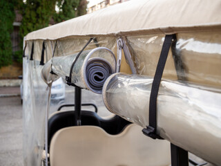 The soft windows of the electric walking car are rolled up