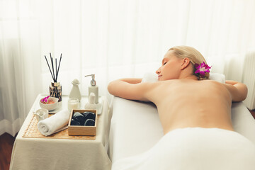 Caucasian woman customer enjoying relaxing anti-stress spa massage and pampering with beauty skin...