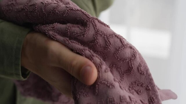 Hand towel.
Wet hands.
He wipes his hands with a napkin.
Wet hands.
Hands and underwear close-up.
Hand hygiene after a walk.
Drops of water on hands.
Hands, towel