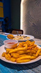 french fries with ketchup and white sauce pasta