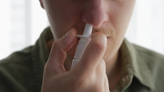 Treatment of a stuffy nose.
A man uses a nasal spray.
Swelling of the nose.
Treatment of a runny nose with drops.
Nasal drops.
Nose, spray, drops, snot, treatment, cold, flu, sinusitis, disease
