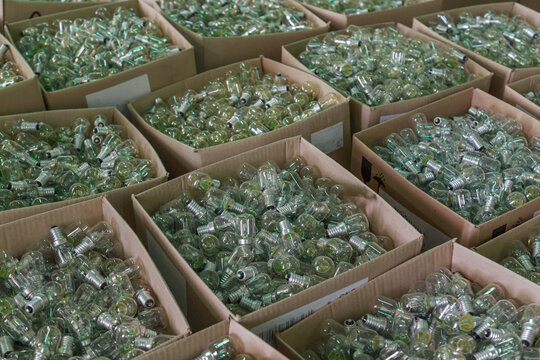 Thousands of electric lapms in the boxes at packaging workshop.