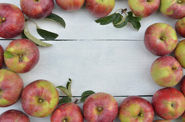 fall apple frame on a white wooden table