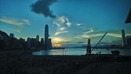 Shotting the Sunset of Victoria Harbour  with IFC from Hong Kong Convention and Exhibition Centre