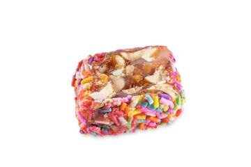 Multi-colored sprinkles peanuts honey rahat lokum on white isolated background