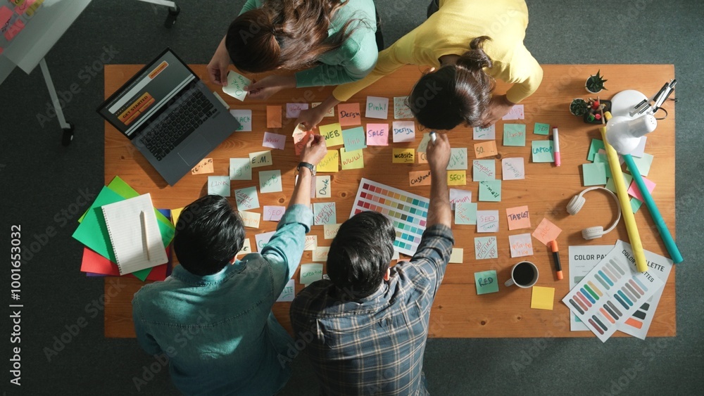 Poster time lapse of business team with casual outfit looking laptop screen and sharing idea. aerial view o