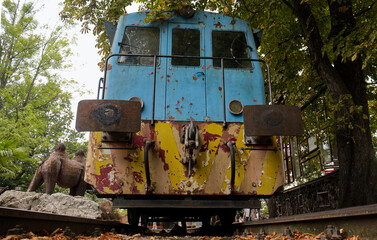 Old decommissioned wagon. Carriage of a passenger train. Wagon at a dead end. Old disused train...