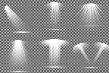 The spotlight shines on the stage. light exclusive use lens flash light effect. light from a lamp or spotlight. lighted scene. podium under the spotlight.