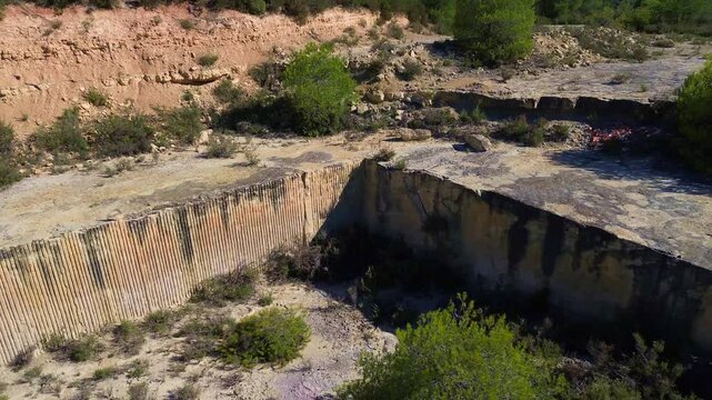 Drone Flying Away from Stone Quarry of Vinaixa