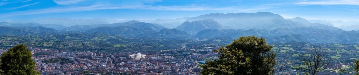 Fototapeta premium Panoramic view on Oviedo city and surrounding mountains in Oviedo, Spain