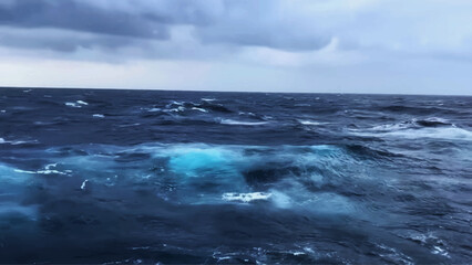 Cruise ship on the ocean in cloudy weather