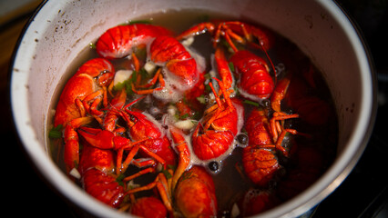 A pot of delicious crayfish is currently being cooked in a flavorful sauce