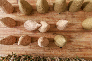 Close view of incense cones on a wooden board.