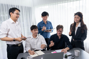 Group of diverse office worker employee working together on strategic business marketing planning in corporate office room. Positive teamwork in business workplace concept. Prudent